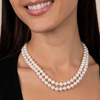 A model wearing the pearl necklace