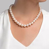 A model wearing the pearl necklace